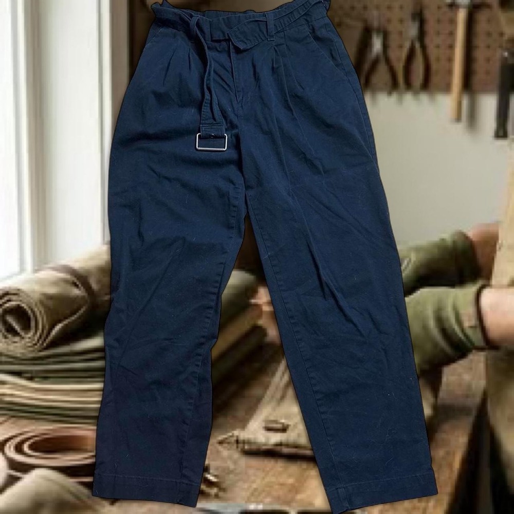 black pants with belt attached, silver d buckle ; a new day brand size 8